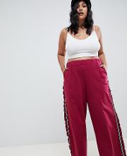 asos design curve wide leg jogger with side tape and frill