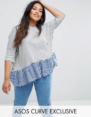 oversized top in boxy fit with woven gingham hem