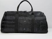 duffle bag in black with bomber styling