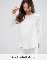 blouse with exaggerated sleeve