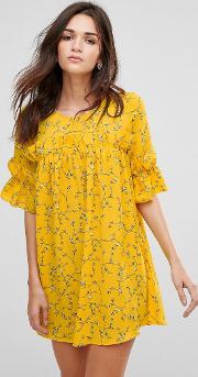 3/4 sleeve ditsy floral print dress with ruffle detail