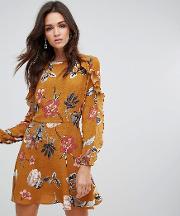 long sleeve shift dress with frill detail in bold floral print