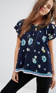 embroidered frilled top