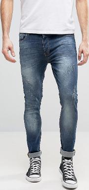 abrasion skinny jeans