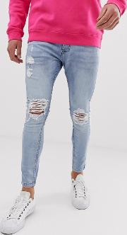 Ripped Skinny Jeans With Side Stripe