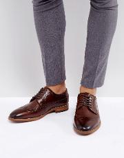 uniessi brogue shoes in brown