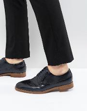 uniessi brogue shoes in navy