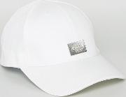 baseball cap with metal logo detail