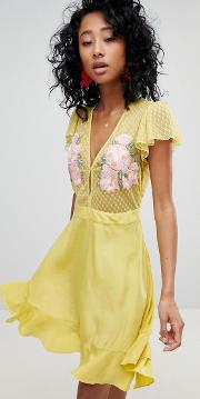 ruffle mini dress with floral embroidery