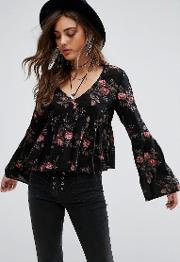 floral print top with bell sleeve