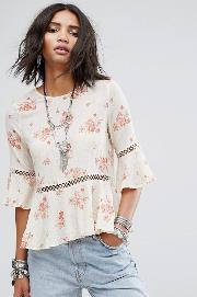 peplum top with floral print