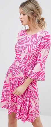 mini skater dress with flared sleeves  abstract pink print