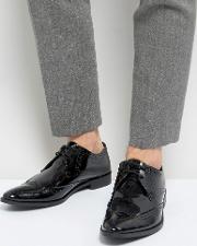 brogue derby shoes in patent leather
