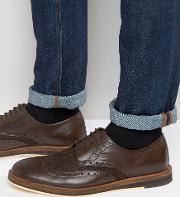 textured brogues in brown leather