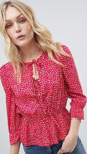 top with tie front and frill sleeves in ditsy floral