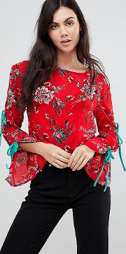 top with wide ribbon tie sleeves in floral