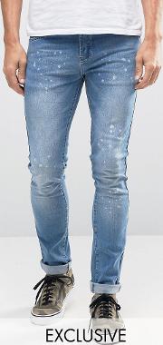 hero's heroine skinny jeans with paint splatter