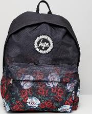 backpack in faded rose print