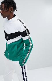 track jacket in green with chevron print