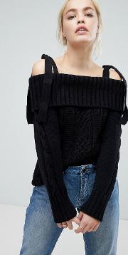 cold shoulder jumper with tie shoulders in cable knit