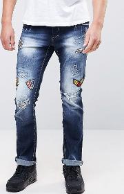 Ripped Jeans With Patches In Slim Fit