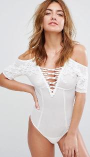 cold shoulder bodysuit with lace up front and  trim
