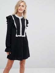 shift dress with ruffles and contrasting lace details