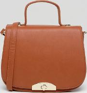 orange saddle bag with handle  detachable cross body strap
