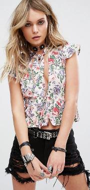 tie neck top in floral with deep v cut out