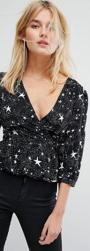 wrap front top with ruffle in star print