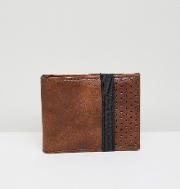wallet with elasticted strap in tan