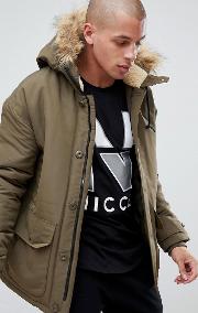 nicce parka jacket in green with fur hood