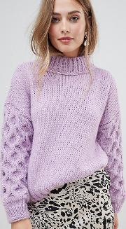 hand knitted textured sleeve jumper