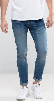 Slim Fit Jeans In Mid Wash Blue With Stretch