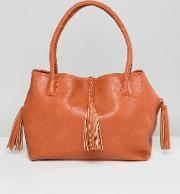 large tote with hanging tassel