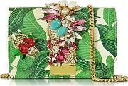 clicky snake leather leaves clutch