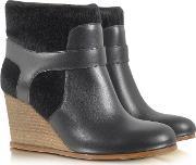 Black Eco Fur And Leather Wedge Bootie