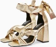 Revolve Leather Gold High Sandals